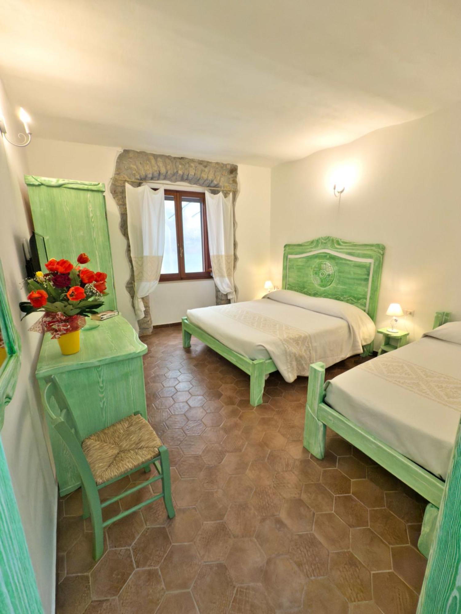 Regnos Altos Boutique Rooms بوسا المظهر الخارجي الصورة