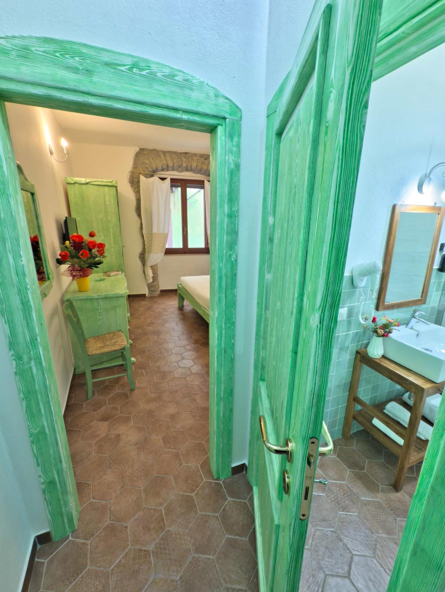 Regnos Altos Boutique Rooms بوسا المظهر الخارجي الصورة